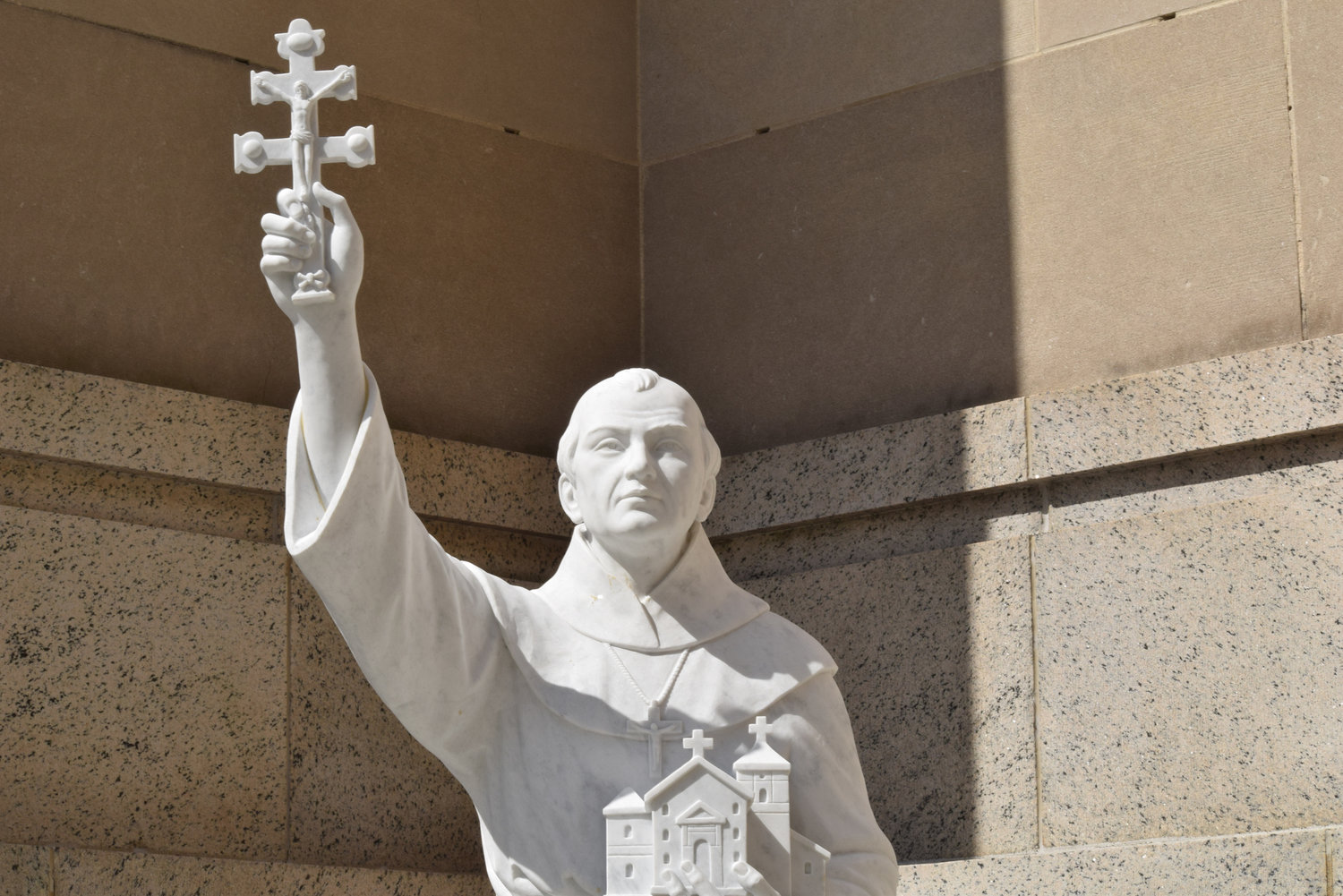 A statue of St. Junipero Serra is nestled in an alcove on the eastern side of the Basilica of the National Shrine of the Immaculate Conception in Washington July 18, 2019.